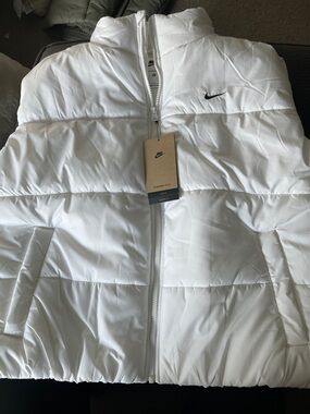 Nike White Puffer Vest with Black Swoosh Logo